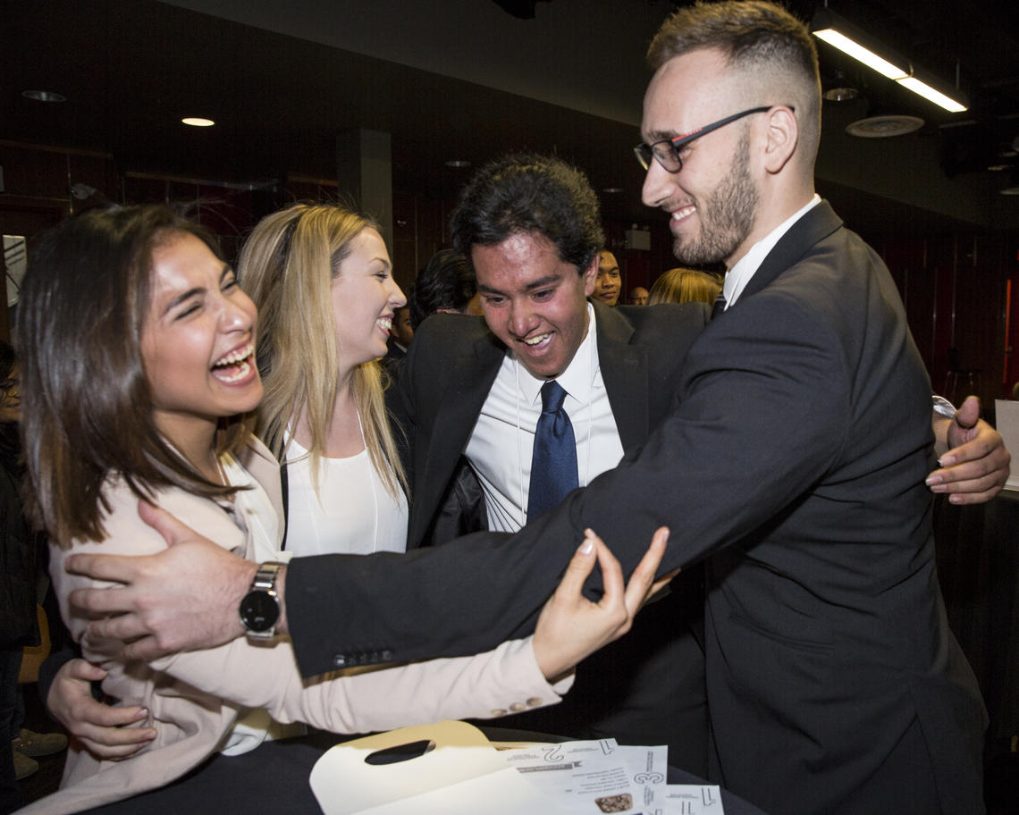 From left, University of Calgary Cups2Go team members Paola Castillo, Madison Wood, Rushil Krishna and Daniel Schneider learn that they won the RBC Fast Pitch Competition. 