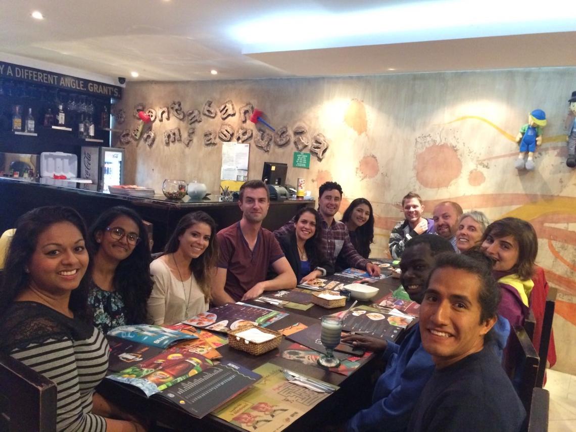 Students Jillian Haneiph, Namrata Sheth, Andria Panidisz, Connor Bedard, Margarita Meza, Nic Ritchie, Cristina Vallejo, Manual Preusser, Jeff Coombs, Irene Herremans, Kassy Harbottle, David Ince, and Alonso Alegre celebrate the end of their internships with a dinner in Quito, Ecuador. Anil Mehrotra, former SEDV director, and David Lansdale, Ecuadorian partner, are not pictured but are also involved in the internships.